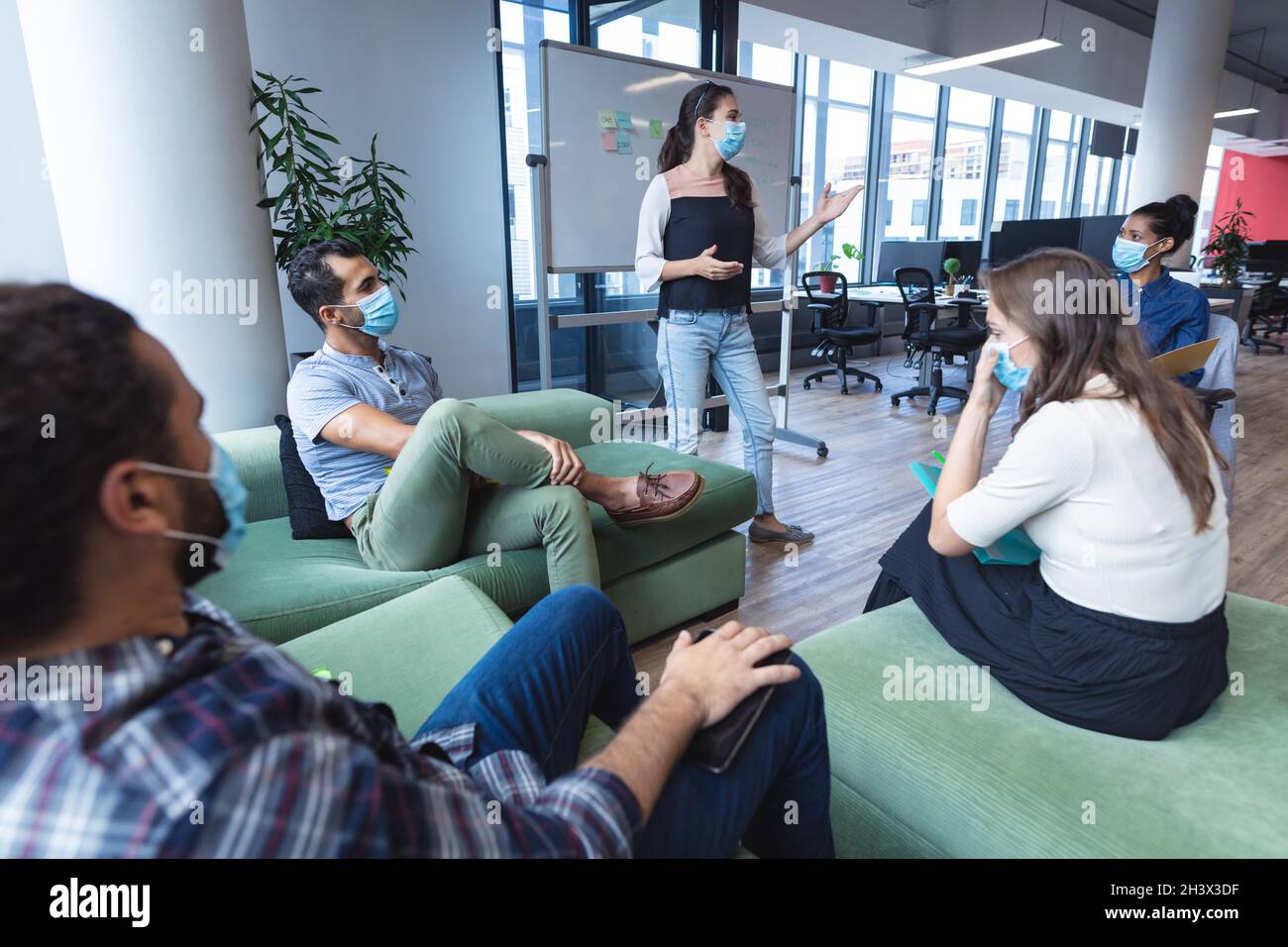 Diverse group wearing face masks hi-res stock photography and images ...
