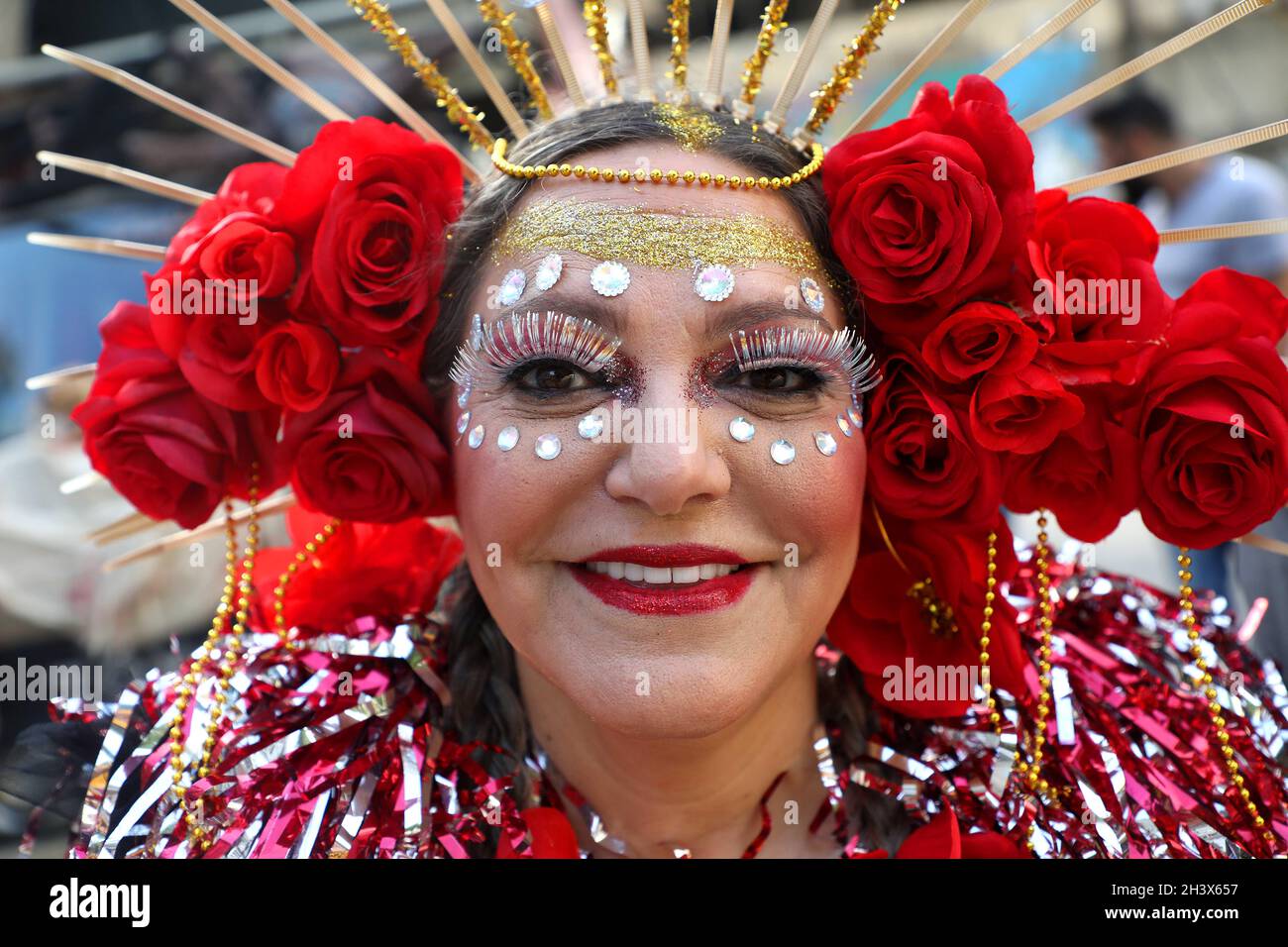 Beirut, Lebanon. 30th Oct, 2021. A woman in costume celebrates