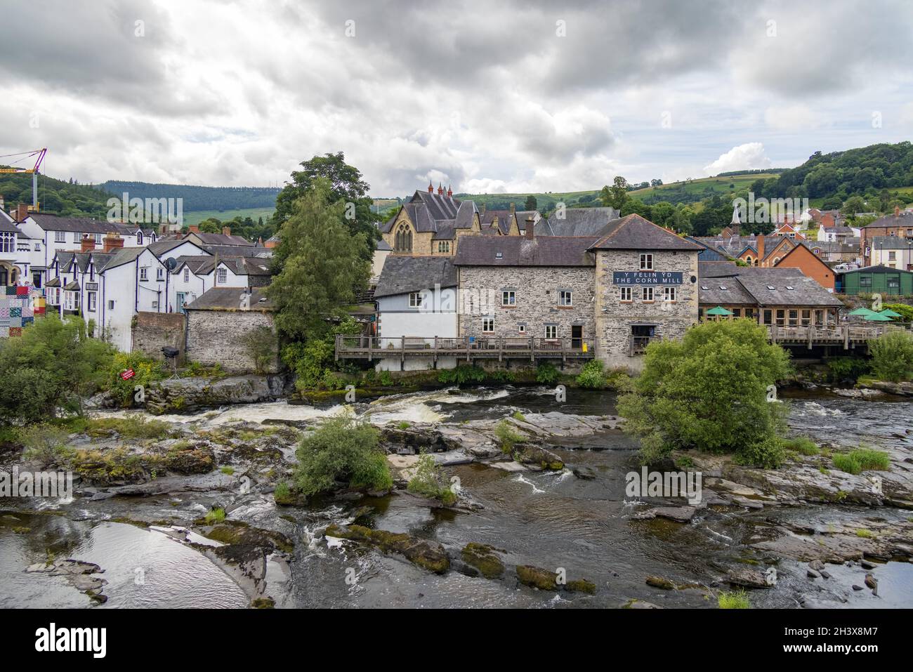 LLANGOLLEN, DENBIGHSHIRE, WALES - JULY 11 : View along the River Dee in LLangollen, Wales on July 11, 2021 Stock Photo