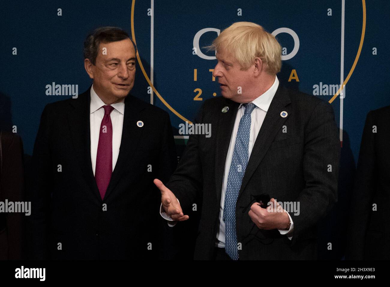 Prime Minister Boris Johnson is greeted by Italian Prime Minister Mario Draghi (left) as he arrives to attend a reception and dinner at The Quirinale Palace in Rome. Picture date: Saturday October 30, 2021. Stock Photo