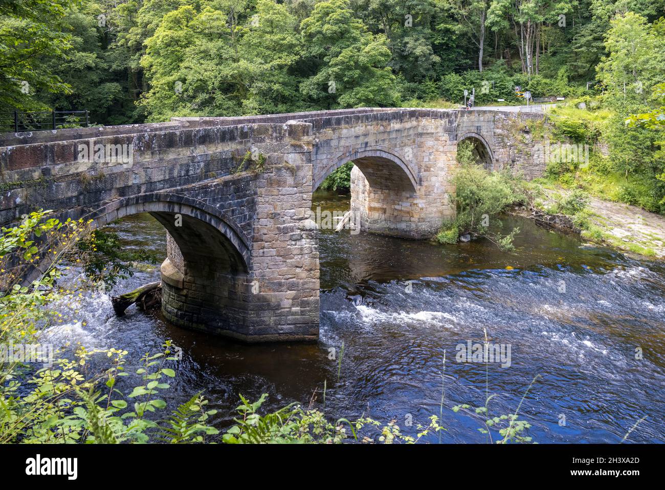 FRONCYSYLLTE, WREXHAM, WALES - JULY 15 : Stone bridge over the River Dee near Pontcysyllte Aqueduct, Froncysyllte, Wrexham, Wale Stock Photo