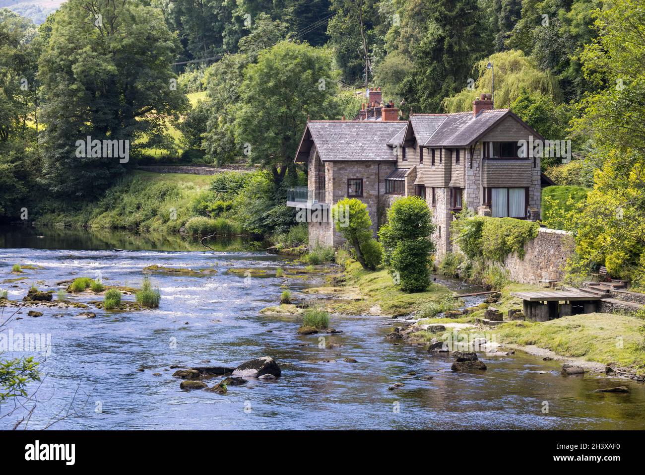 FRONCYSYLLTE, WREXHAM, WALES - JULY 15 : House next to the River Dee near Pontcysyllte Aqueduct, Froncysyllte, Wrexham, Wales, U Stock Photo