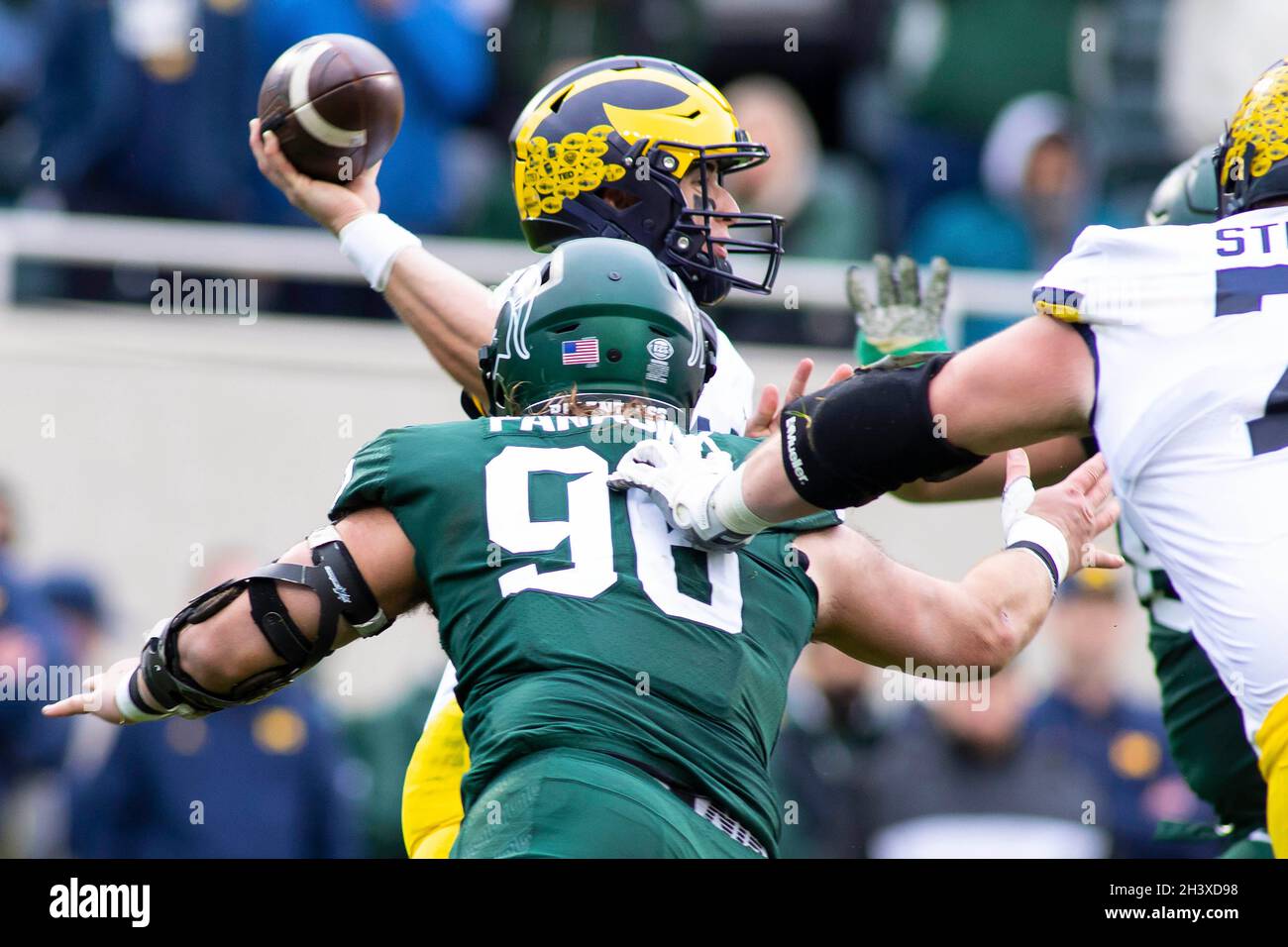 East Lansing, Michigan, USA. 30th Oct, 2021. Michigan quarterback CADE ...