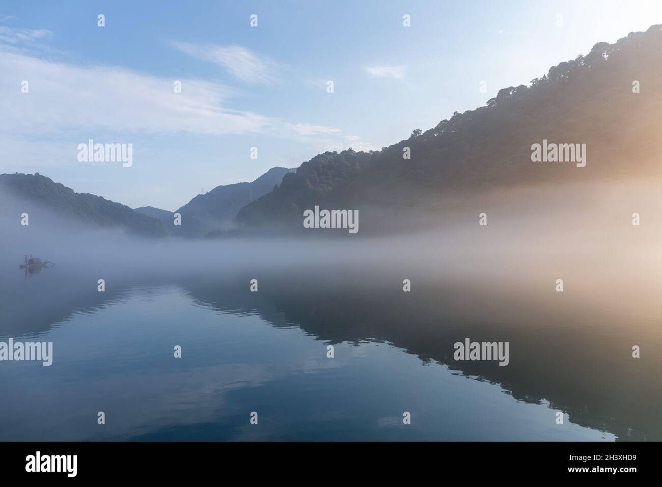 River covered with white fog in sunrise Stock Photo