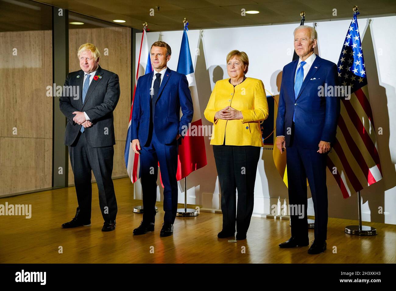 Rome, Italy. 30th Oct, 2021. U.S President Joe Biden holds a meeting with European allies to discuss Iranian nuclear talks on the sidelines of the G20 Summit October 30, 2021 in Rome, Italy. Standing from left to right are: British Prime Minister Boris Johnson, French President Emmanuel Macron, German Chancellor Angela Merkel and U.S. President Joe Biden. Credit: Adam Schultz/White House Photo/Alamy Live News Stock Photo