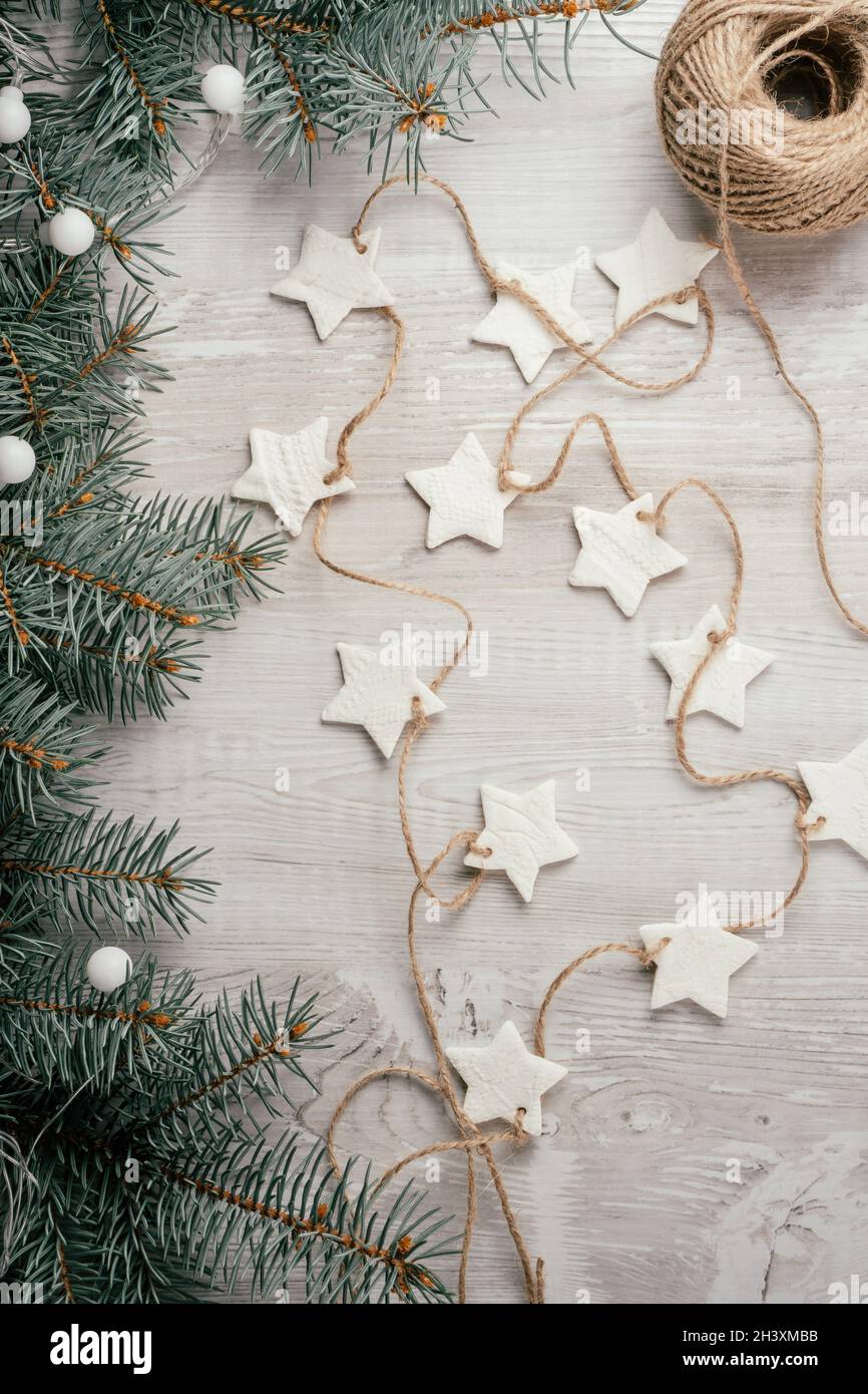 Christmas stars homemade cold porcelain garland with spruce
