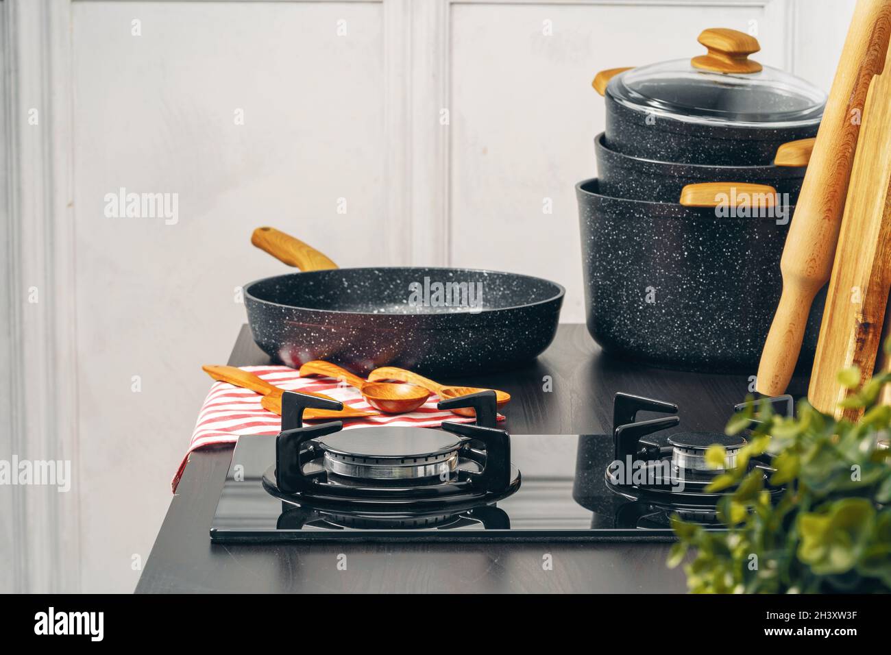 Frying pan on the gas stove in a kitchen Stock Photo Alamy