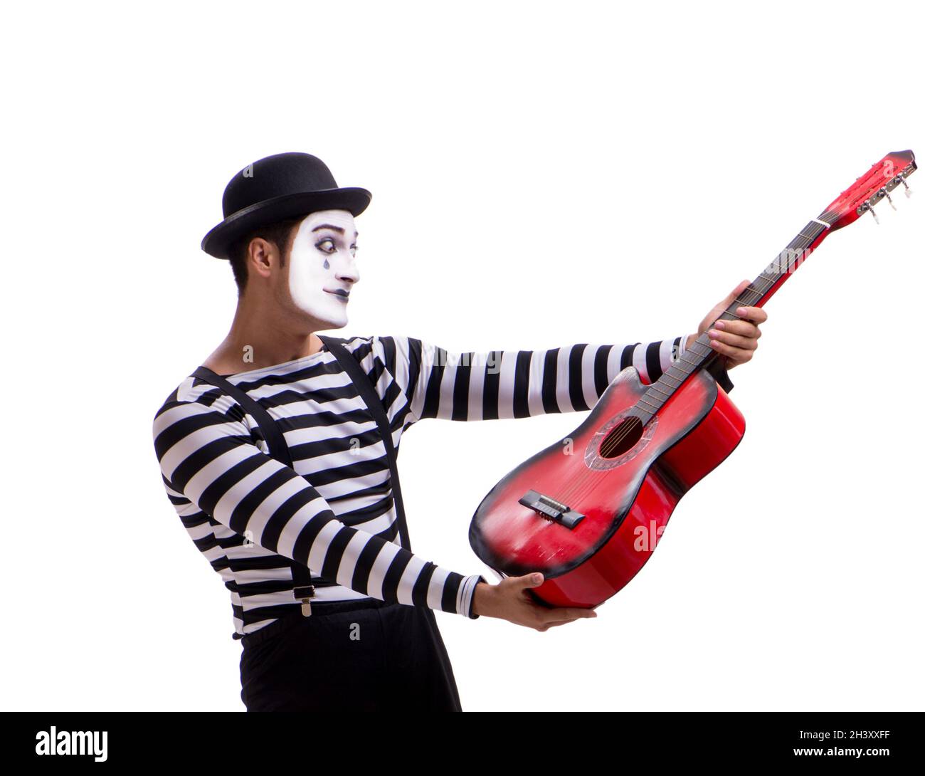 Mime playing guitar isolated on white Stock Photo