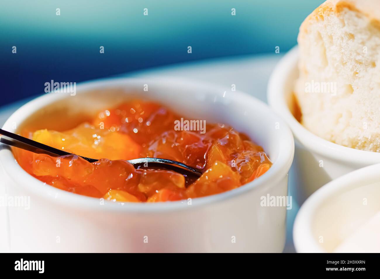 Breakfast outdoors in summer, ham, jam, butter and ham Stock Photo Alamy