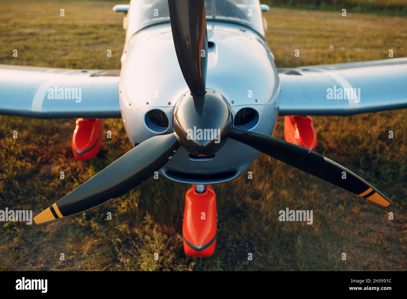 Small private single engine propeller airplane regional airport Stock