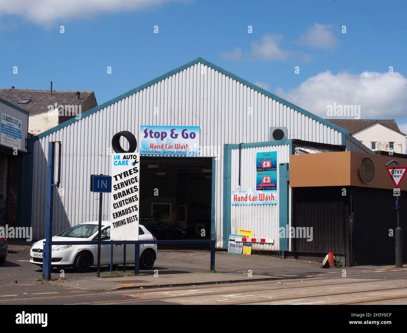 The stop and go hand car wash and uk auto care garage in rochdale greater manchester Stock Photo