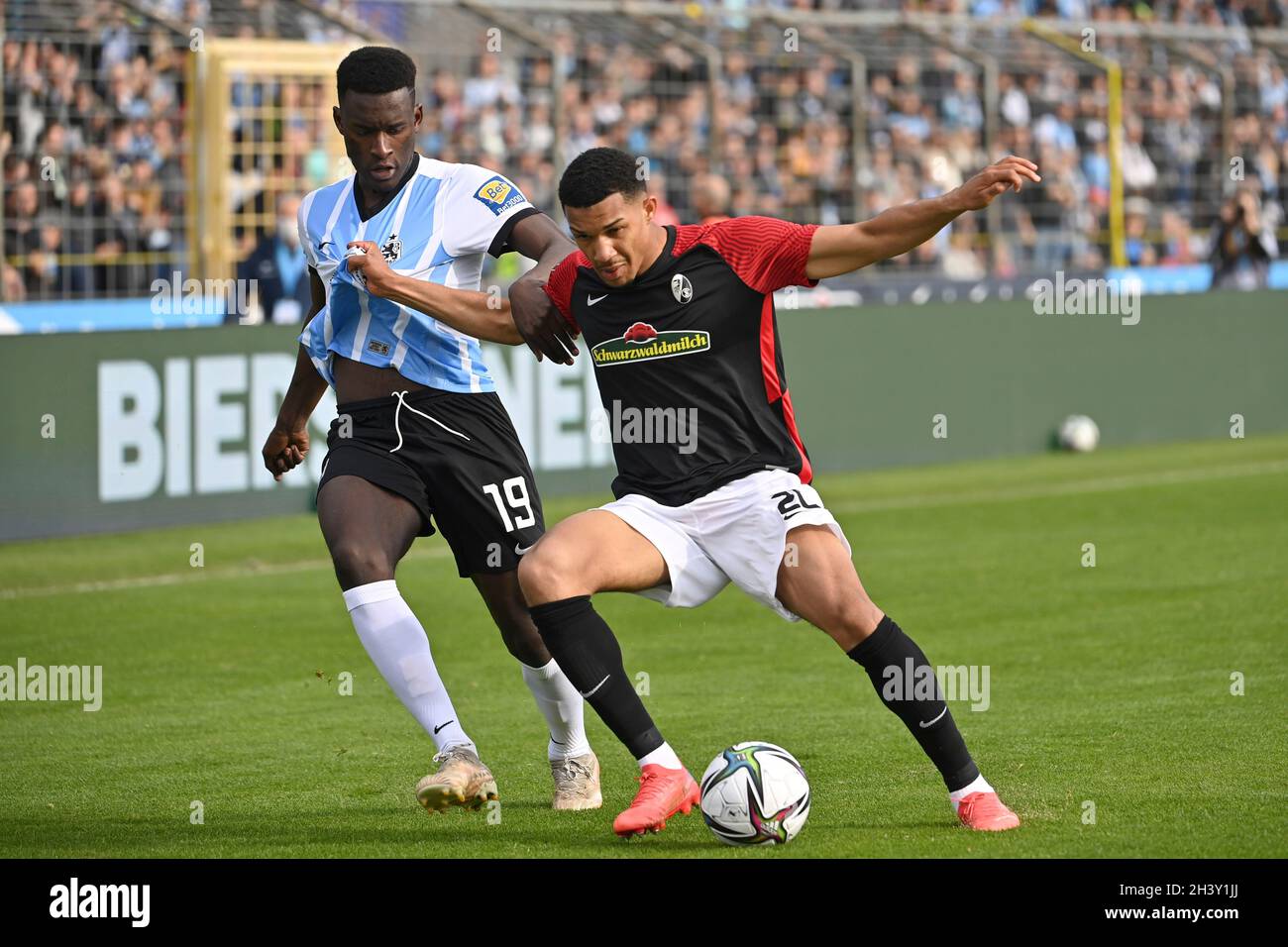 Munich, Deutschland. 30th Oct, 2021. Merveille BIANKADI (TSV Munich 1860),  action, duels versus KENNETH SCHMIDT (SC FREIBURG II). Soccer 3rd league,  Liga3, TSV Munich 1860-SC Freiburg II 6-0 on 10/30/2021 in Muenchen