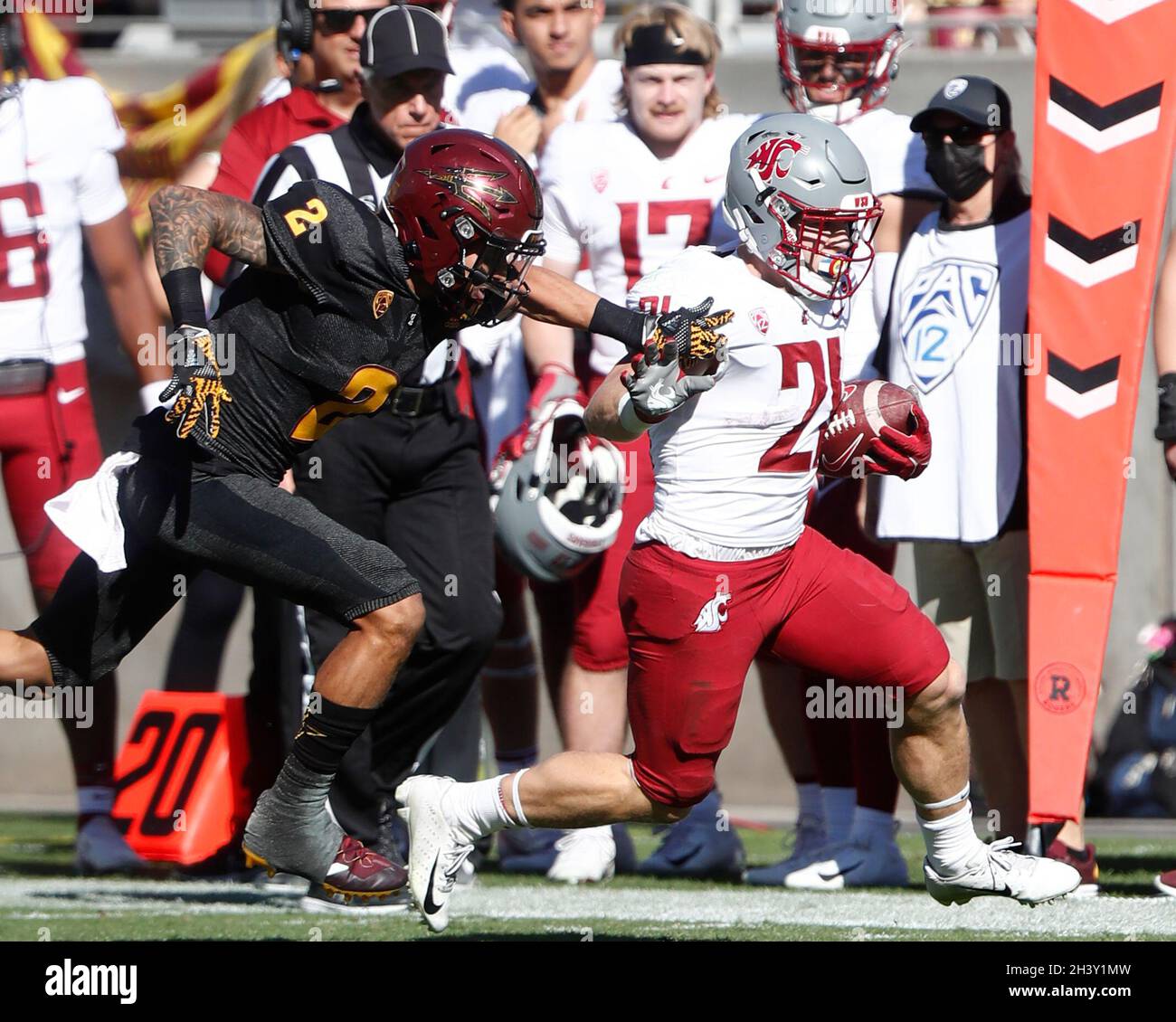 October 30, 2021: Defensive back Jaylen Watson (0) of the Washington State  Cougars intercepts the ball between Washington State Cougars and the  Arizona State Sun Devils at Sun Devil Stadium in Tempe