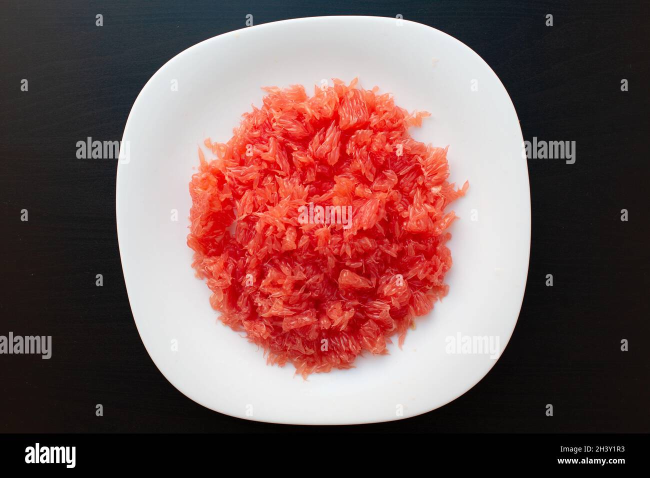 Red grapefruit fiber close-up. Fresh juicy cutted grapefruit without ...