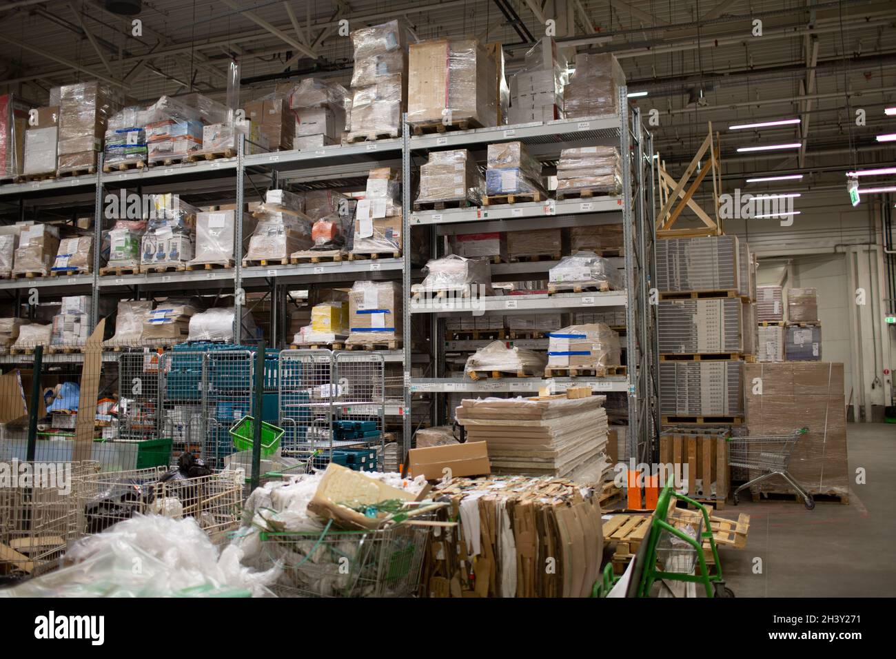 Large furniture warehouse with stuff on shelf in the store Stock Photo