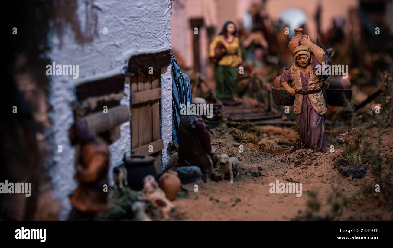 Typical decorative figures of traditional in Christmas of the portal of Belen. A close up photo of a beautiful landscape nativity scene of Spain with Stock Photo