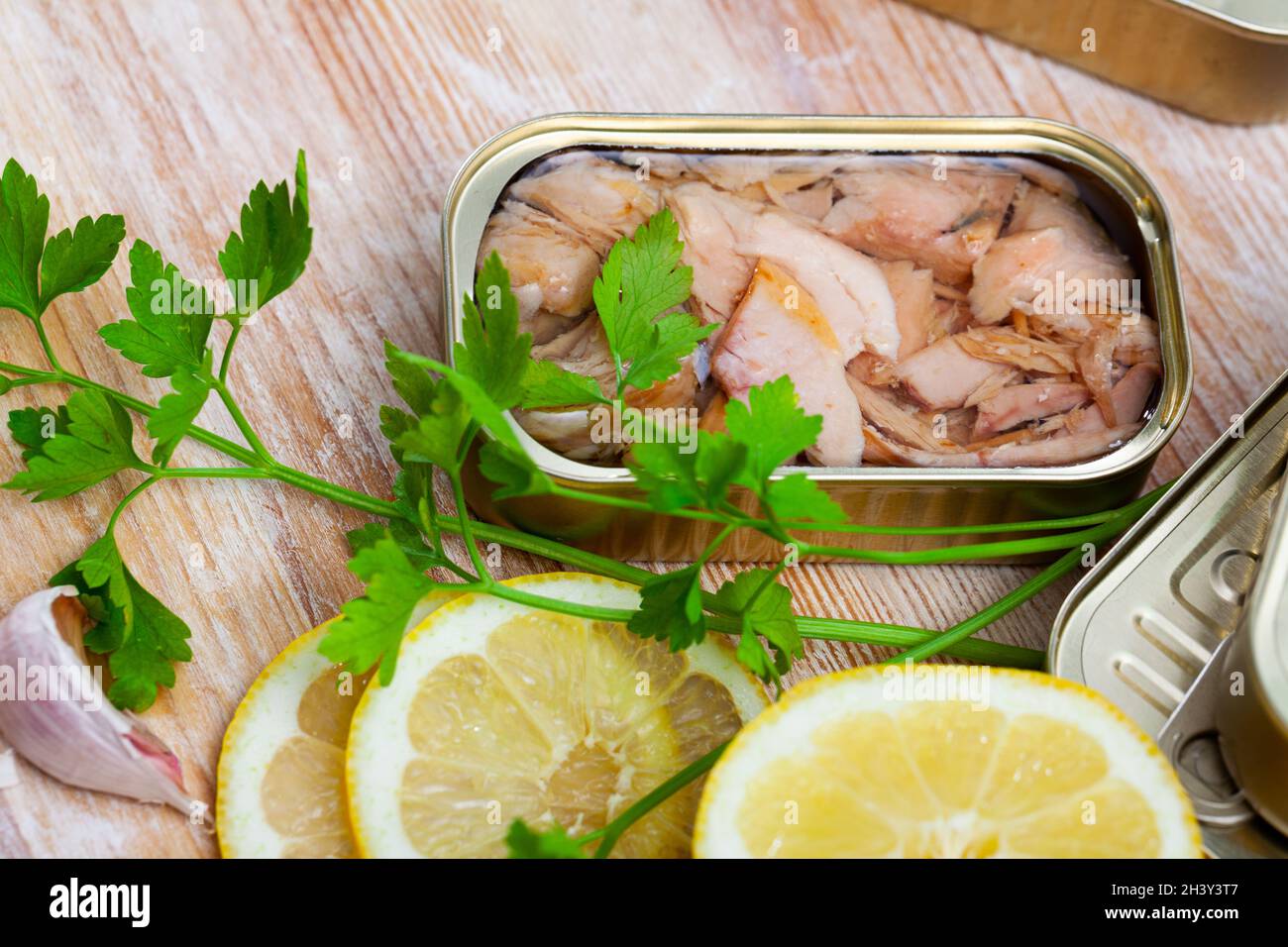 Preserved chopped tuna belly with ingredients for cooking Stock Photo