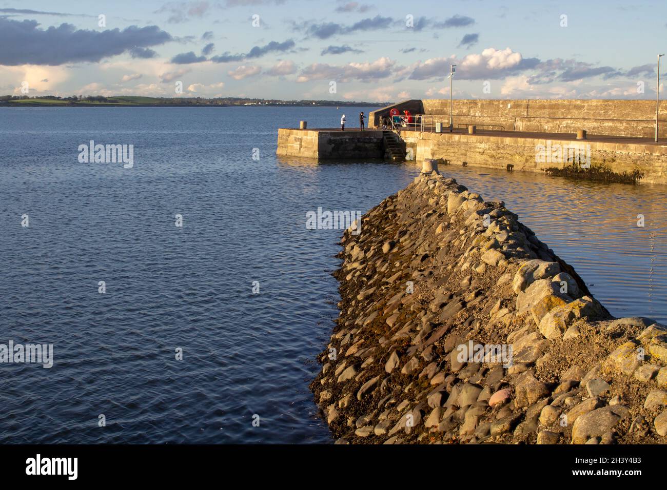 30 October 2021 The scenic pier and harbour at the remote village of Ballyhalbert on the Ards Peninsula in County Down, Northern Ireland on a fine Aut Stock Photo