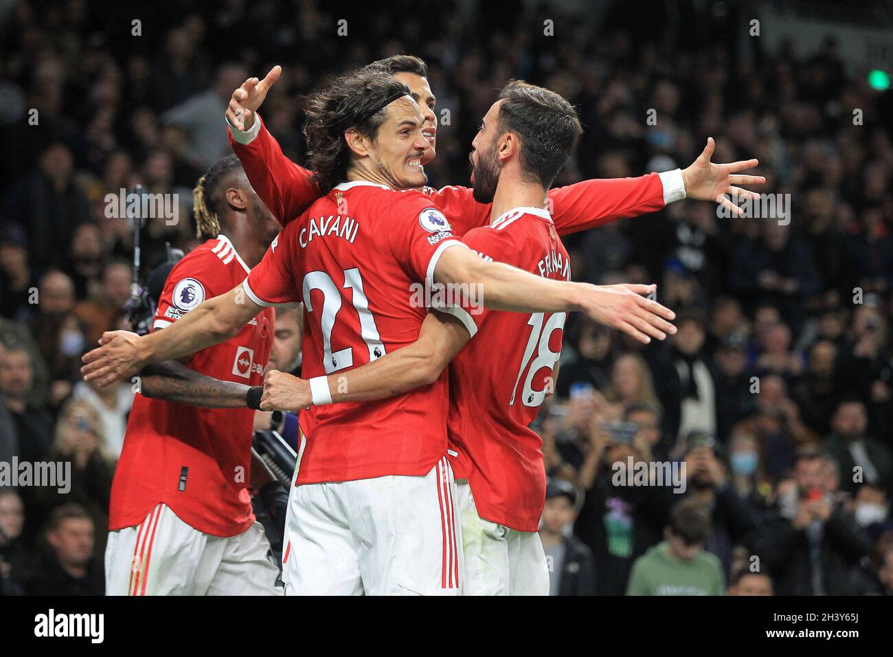 Cristiano Ronaldo of Manchester United (c) celebrates with teammates including Edinson Cavani of Manchester United after he scores his teams 1st goal. Premier League match, Tottenham Hotspur v Manchester Utd at the Tottenham Hotspur Stadium in London on Saturday 30th October 2021. this image may only be used for Editorial purposes. Editorial use only, license required for commercial use. No use in betting, games or a single club/league/player publications. pic by Steffan Bowen/Andrew Orchard sports photography/Alamy Live news Stock Photo