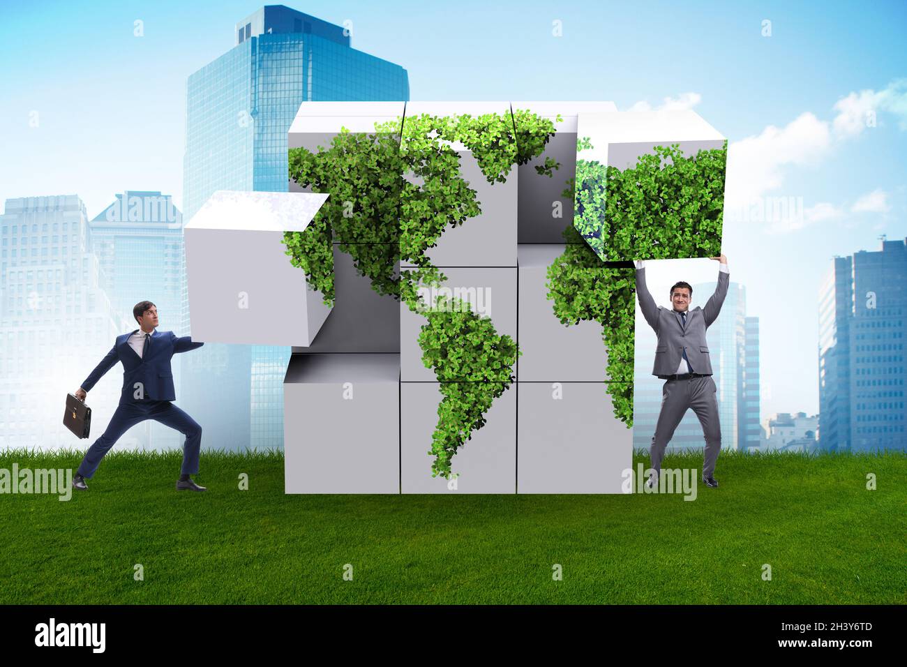 Businessman building world map from cubes Stock Photo - Alamy