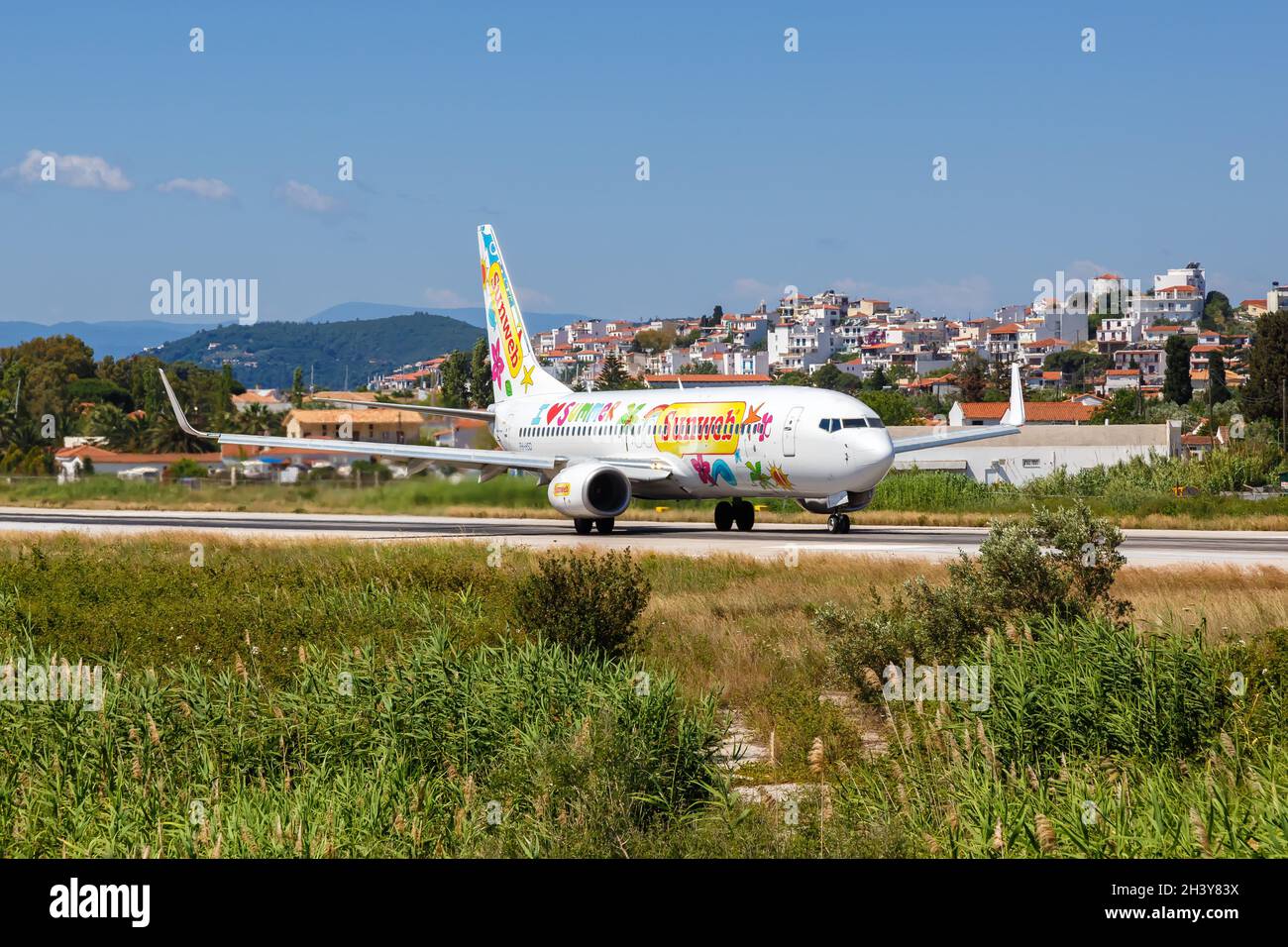 Transavia Boeing 737-800 airplane Skiathos airport in Greece Sunweb special painting Stock Photo