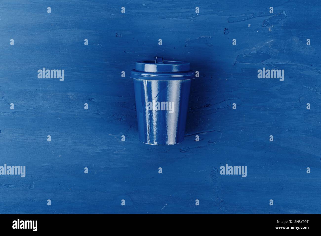 Top view of a takeaway coffee cup on classic blue background Stock ...