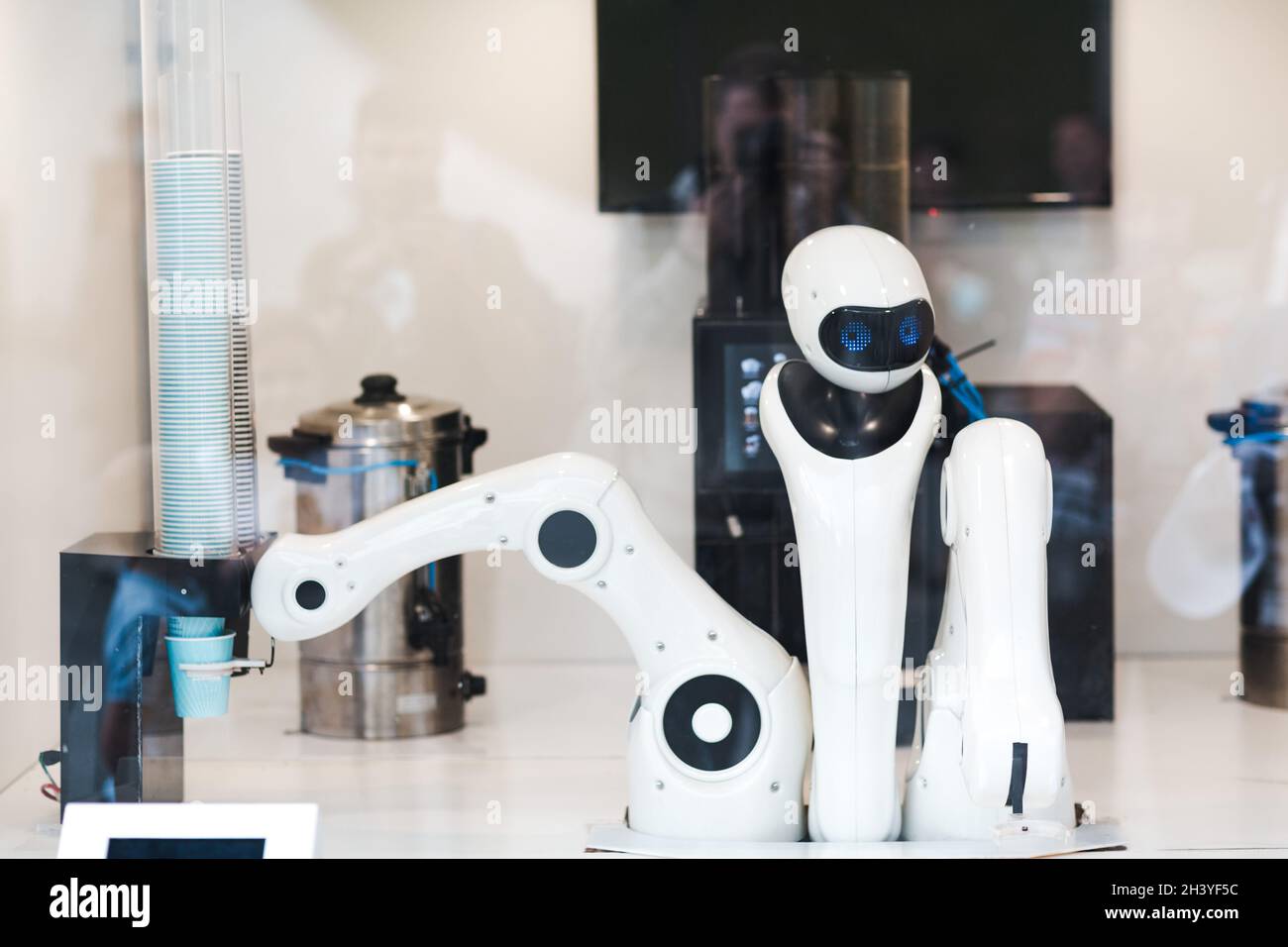 Robot bartender barista prepares coffee in cafe Stock Photo Alamy