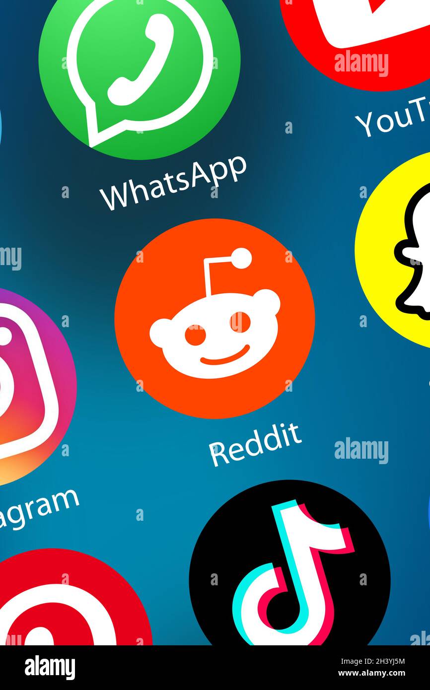 Reddit logo social media icon social network on the background portrait format Stock