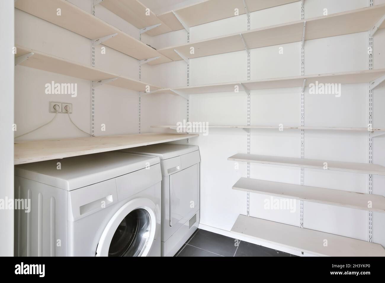 Laundry interior design in a luxury house Stock Photo - Alamy