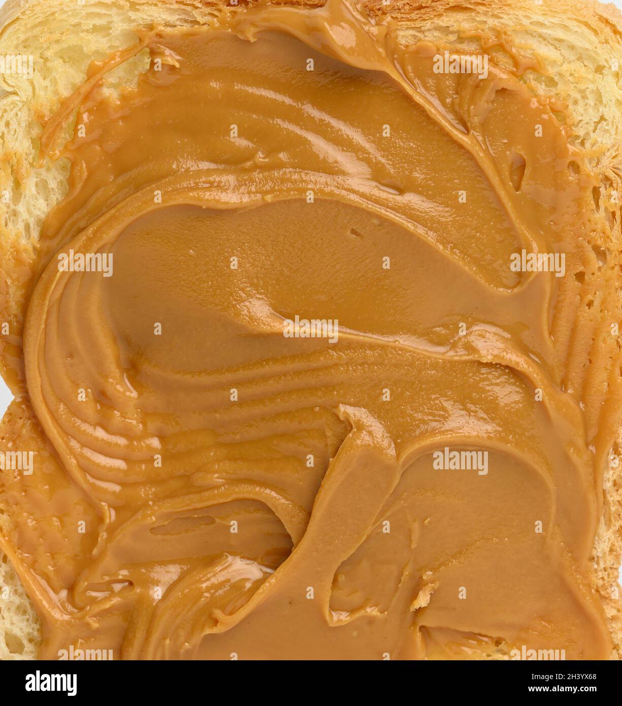 Texture of peanut butter spread on bread, full frame Stock Photo Alamy