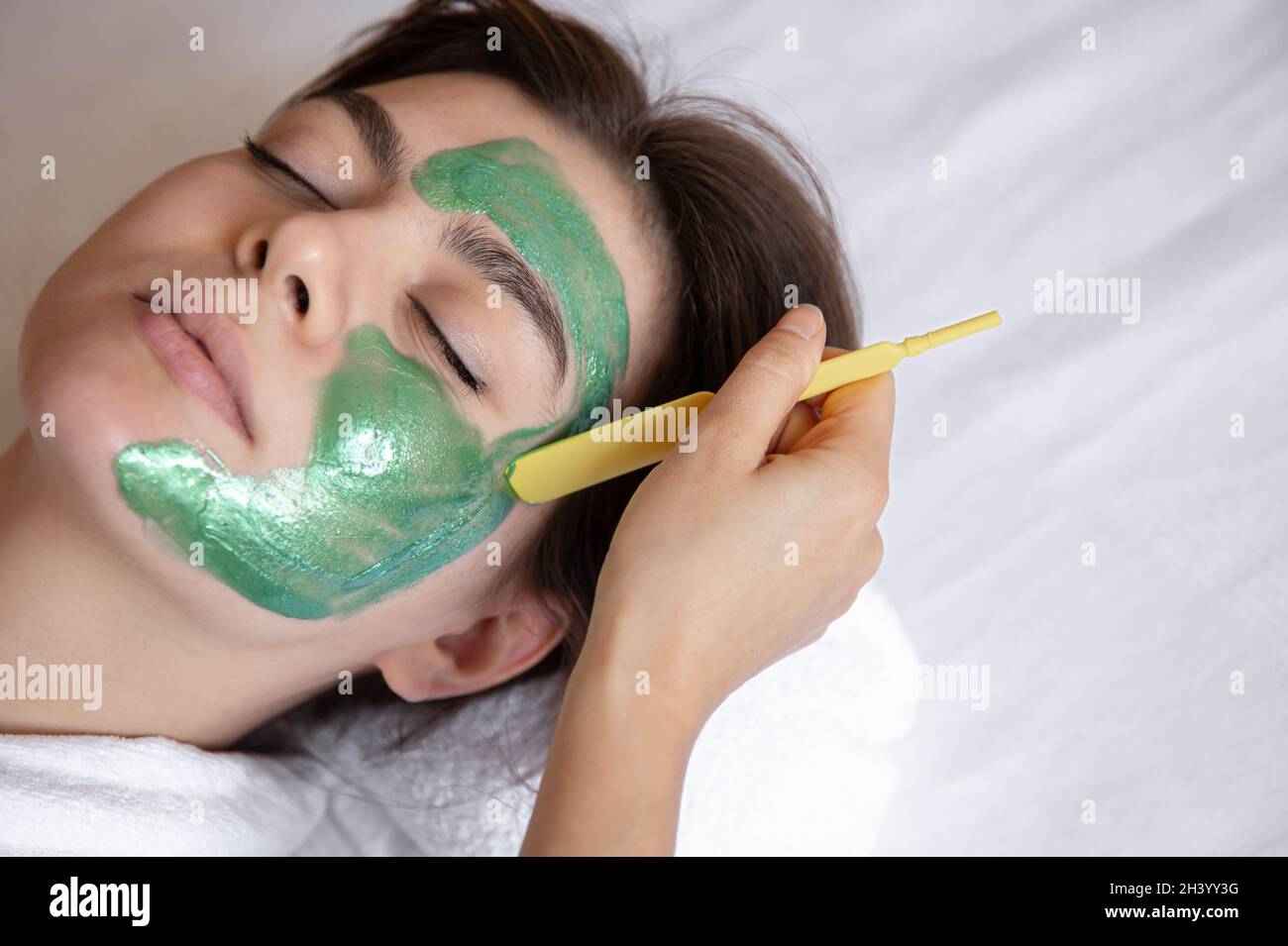 Beautiful woman cosmetic mask hi-res stock photography and images - Alamy