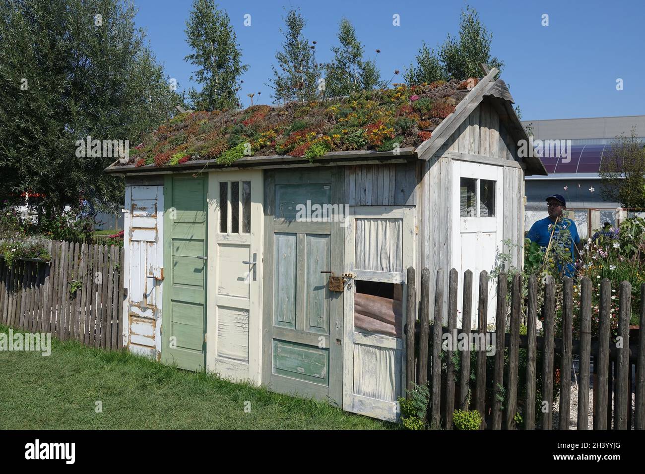 Garden shed with green roof Stock Photo