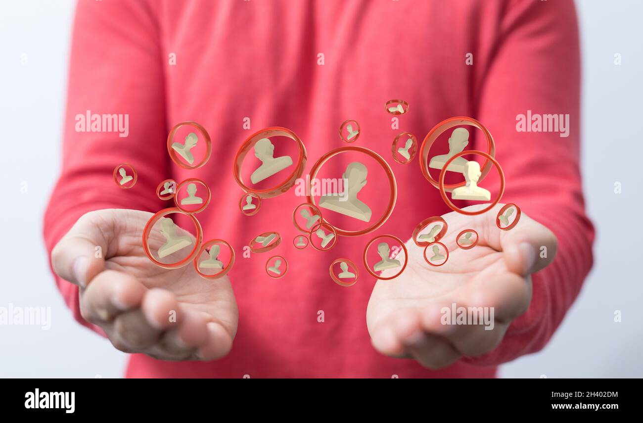 A 3D rendering of a group of floating people icons on a businessman's ...