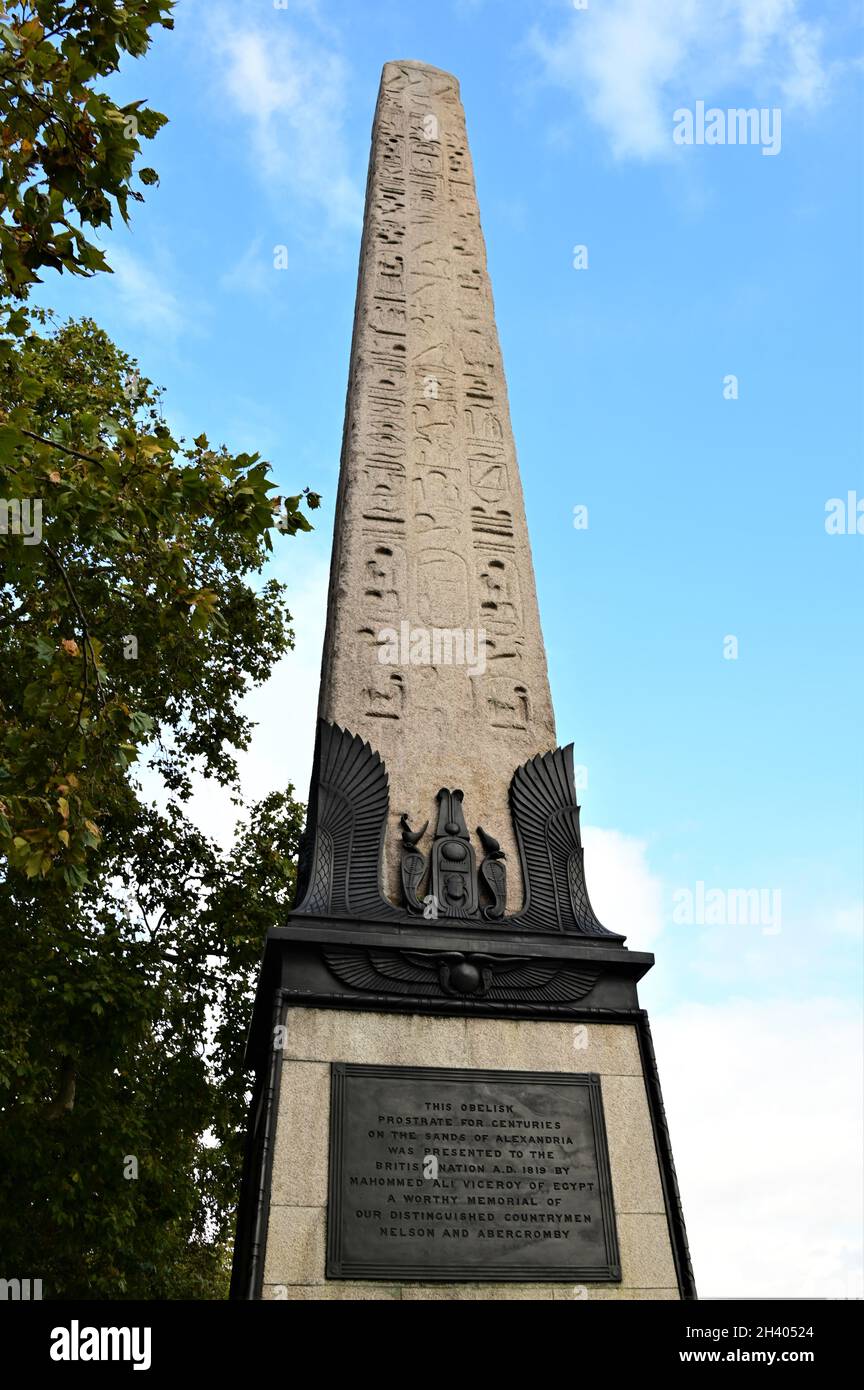 A view of the iconic Cleopatras needle, a stone obelisk and Sphynx like ...