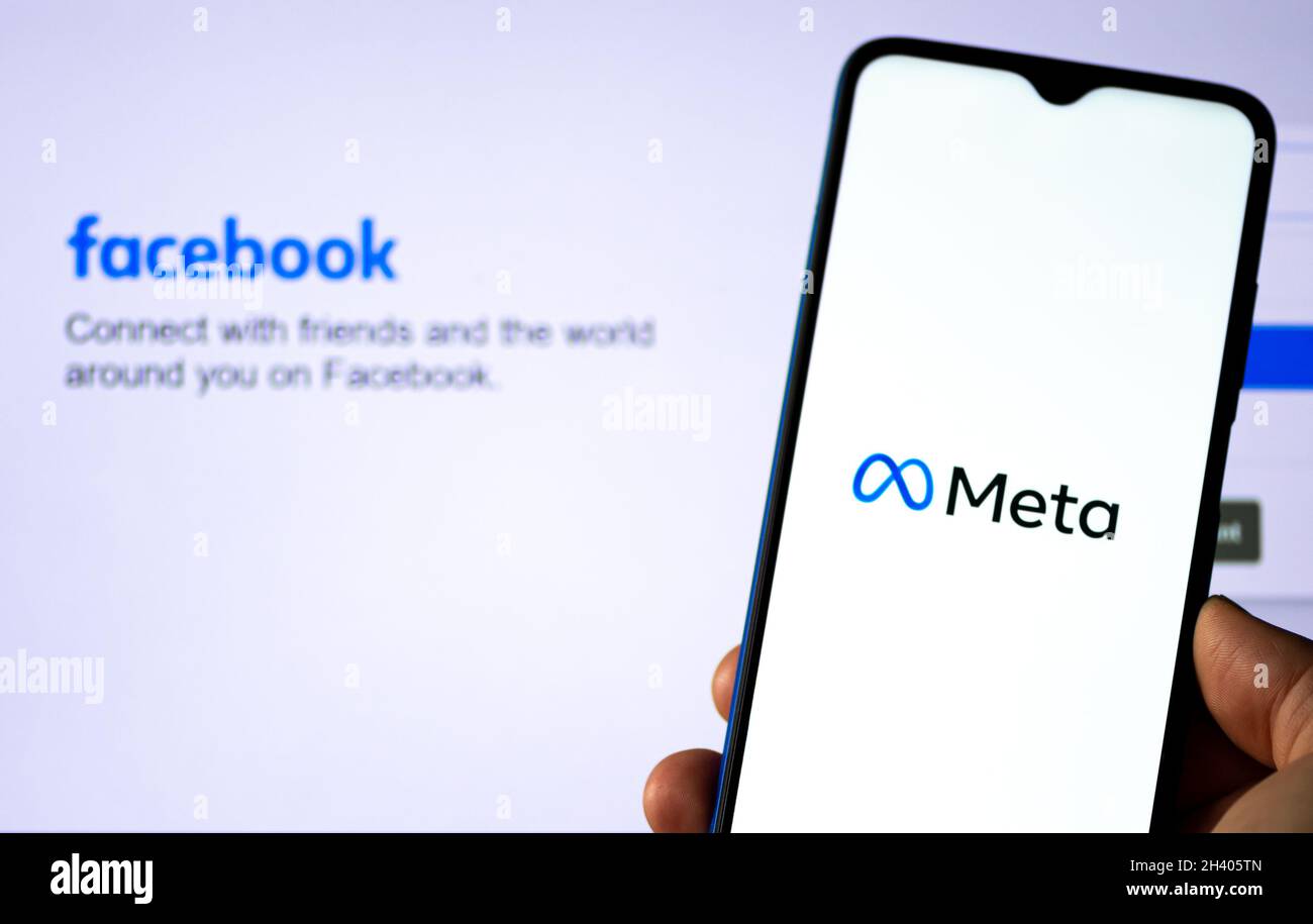 Meta Platform on the smartphone with Facebook home page on background, American multinational technology conglomerate Stock Photo