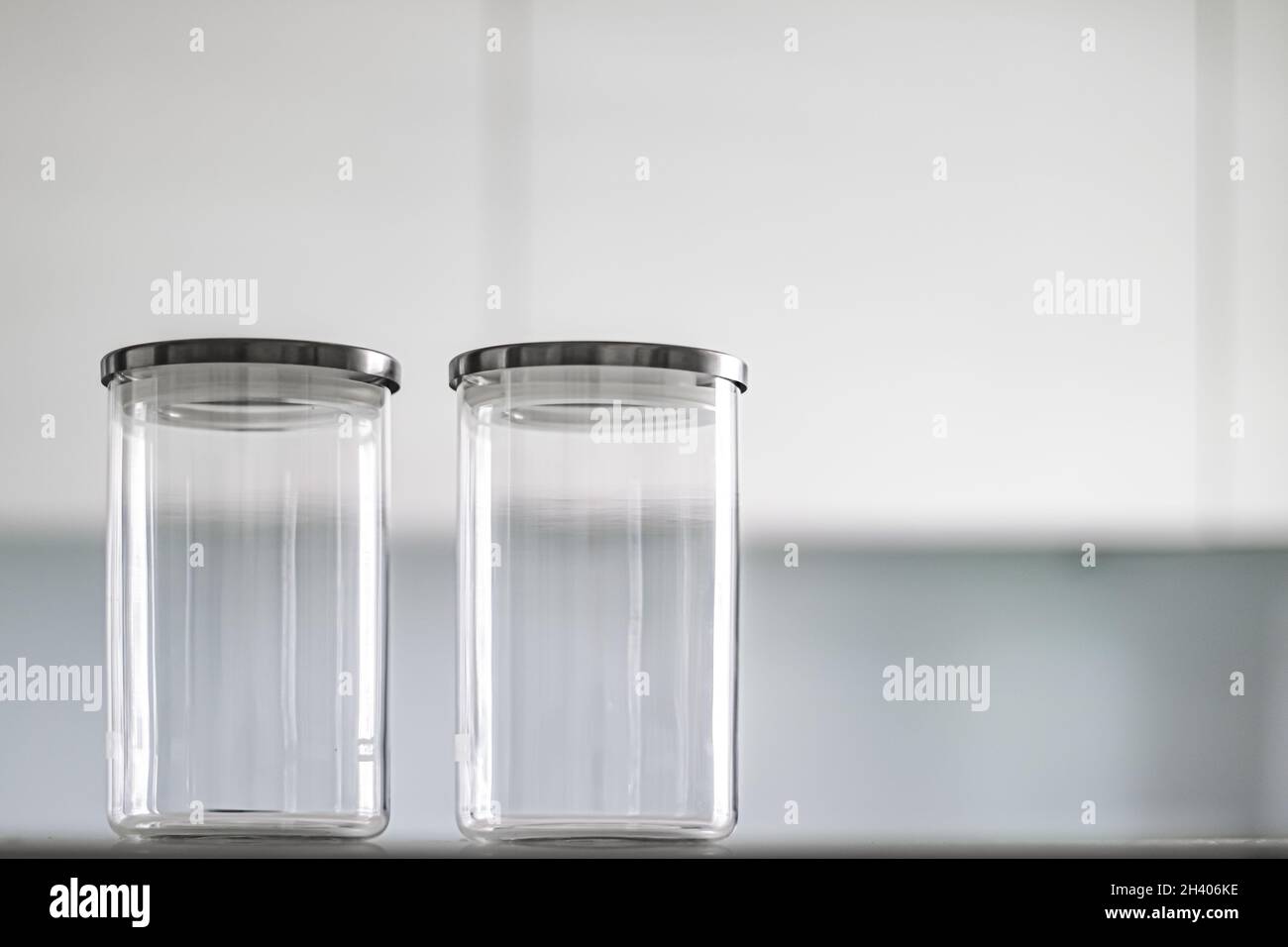 Empty glass jars for food pantry storage Stock Photo