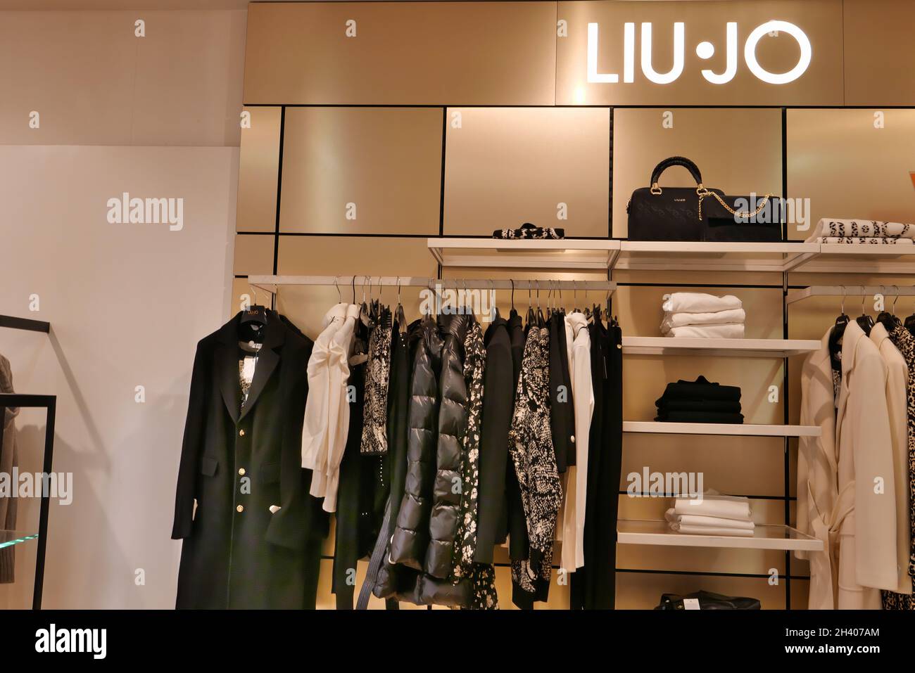 LIU JO CLOTHING ON DISPLAY INSIDE THE FASHION STORE Stock Photo