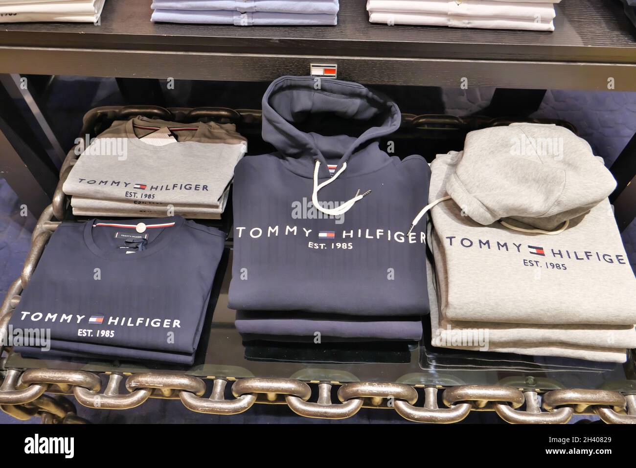TOMMY HILFIGER CLOTHING ON DISPLAY INSIDE THE FASHION STORE Stock Photo -  Alamy
