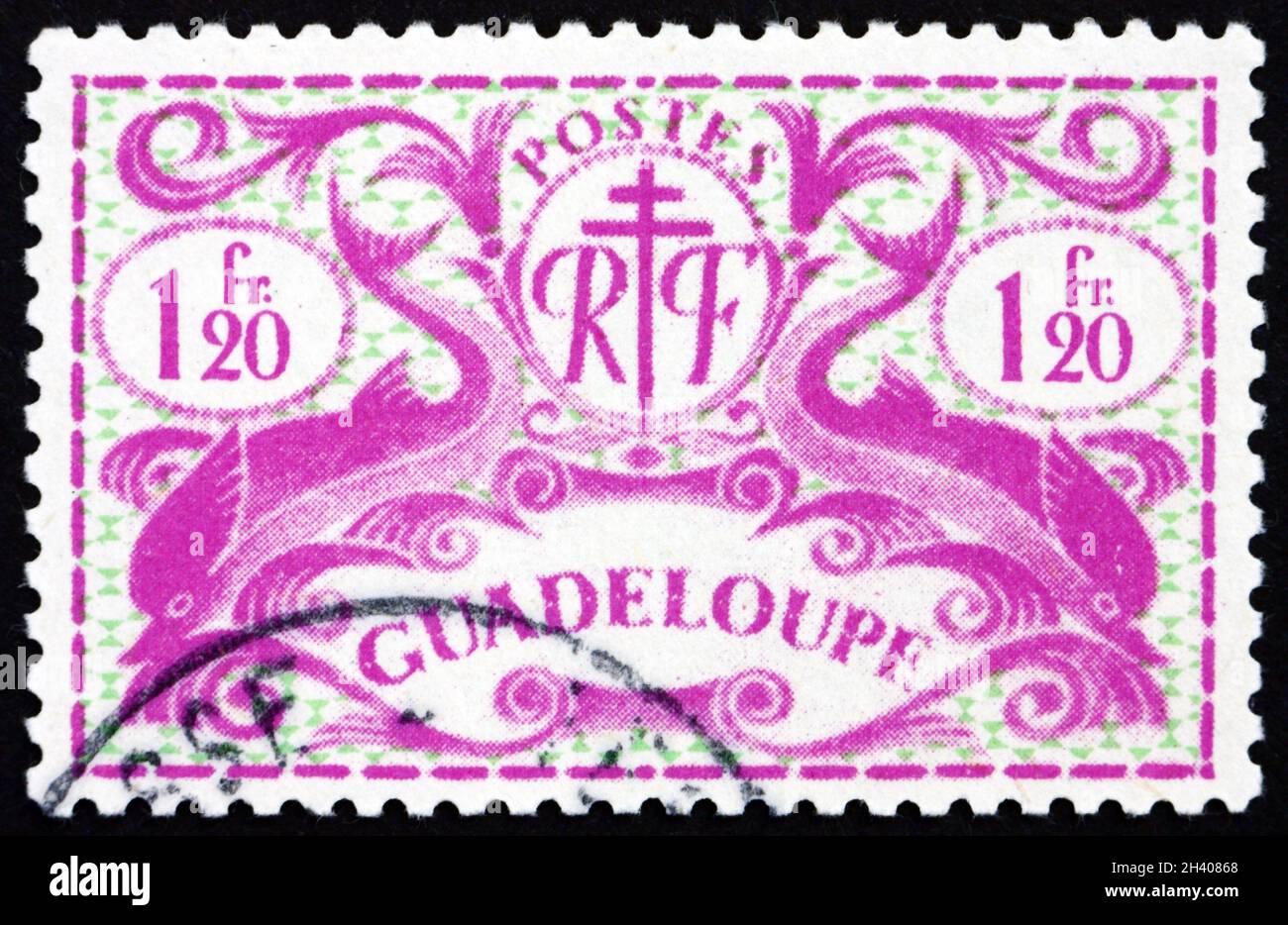 GUADELOUPE CIRCA 1945 a stamp printed in Guadeloupe shows Dolphins