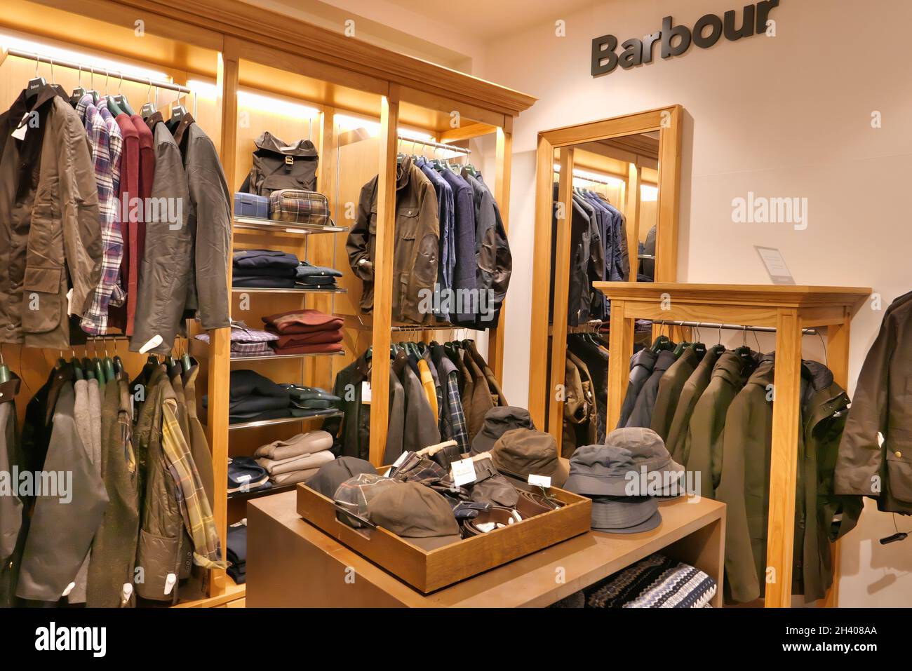BARBOUR CLOTHING ON DISPLAY INSIDE THE FASHION STORE Stock Photo - Alamy