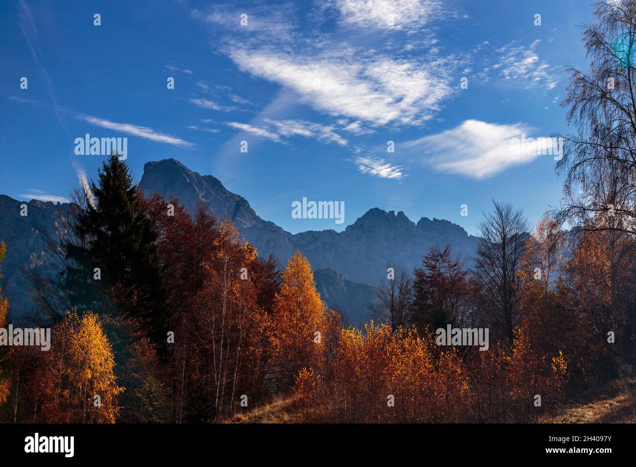Sunny day in the carnic alps during a colorful autumn Stock Photo - Alamy