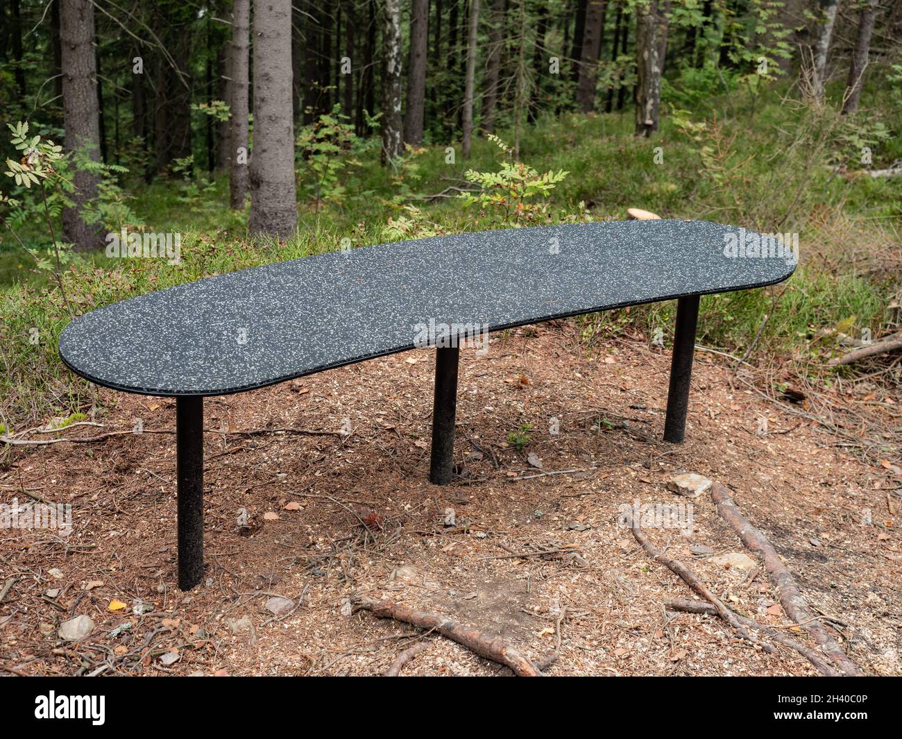 Outdoor bench seat made from pressed milled rubber waste.  Practical, ecological and  comfortable. Total recycling Stock Photo