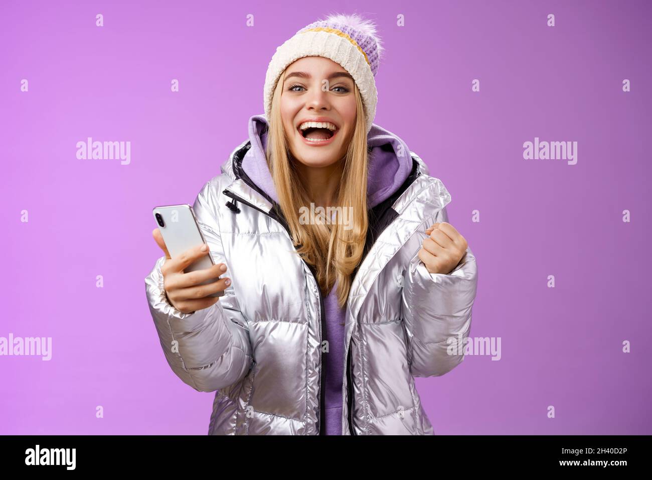 Cute happy triumphing blond hi-res stock photography and images - Alamy