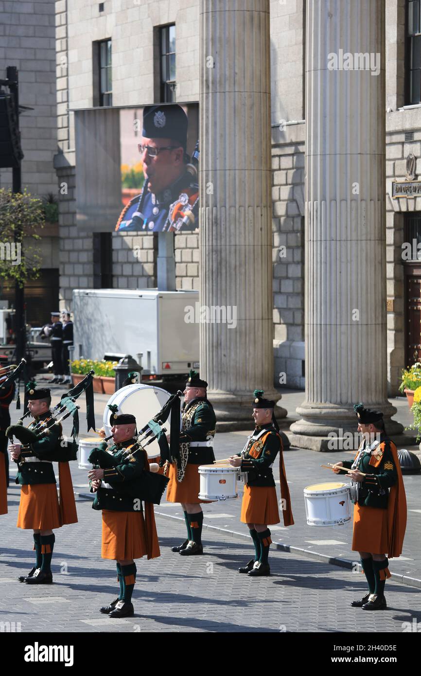 A military parade has taken place in Dublin to commemorate the 1916 Rising. President Michael D Higgins lead a wreath in front of the GPO the building Stock Photo