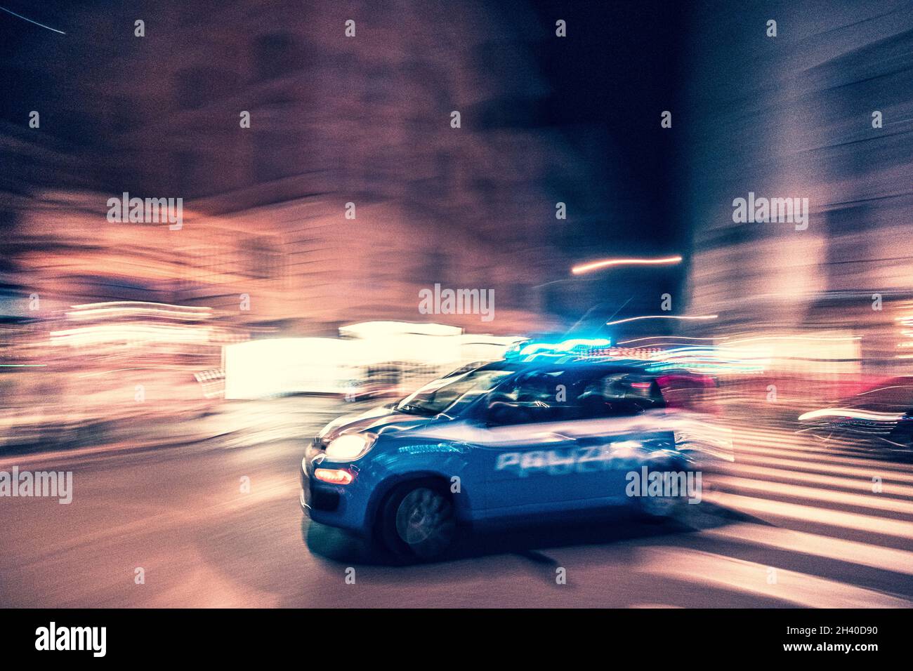 Police car in motion in Rome Italy, blurred background Stock Photo