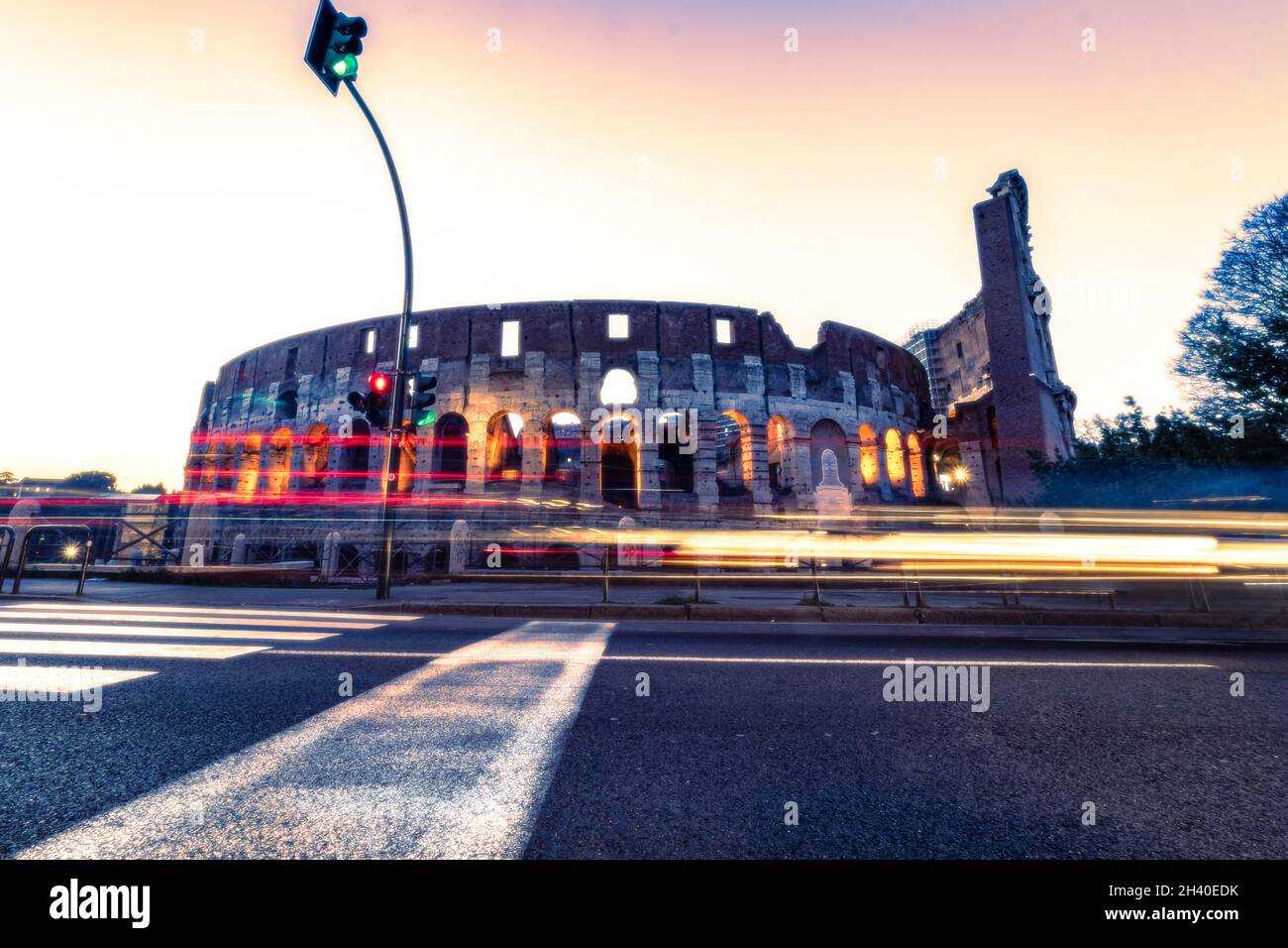 Colosseum at night Rome Italy with long exposure lights. Fast-moving ...