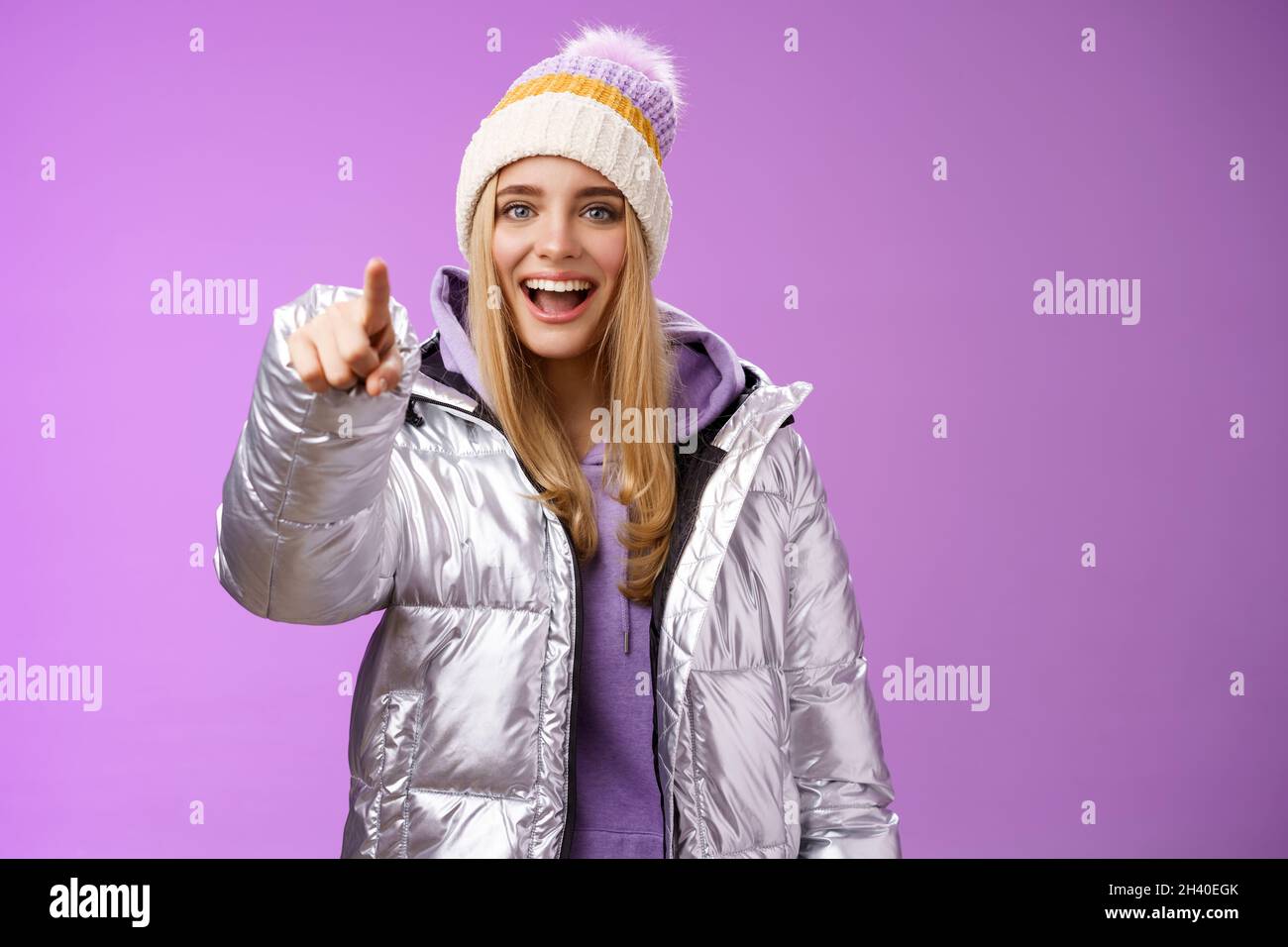 Girl make fun of clumsy friend pointing finger cruel ignorant laughing over funny amusing situation indicating camera standing h Stock Photo