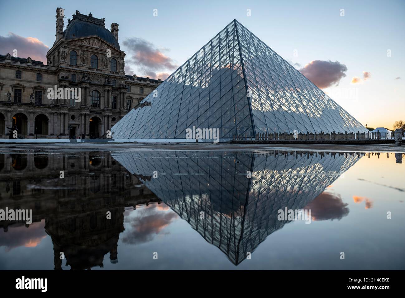 Louvre pyramid at sunset, Paris, France Stock Photo