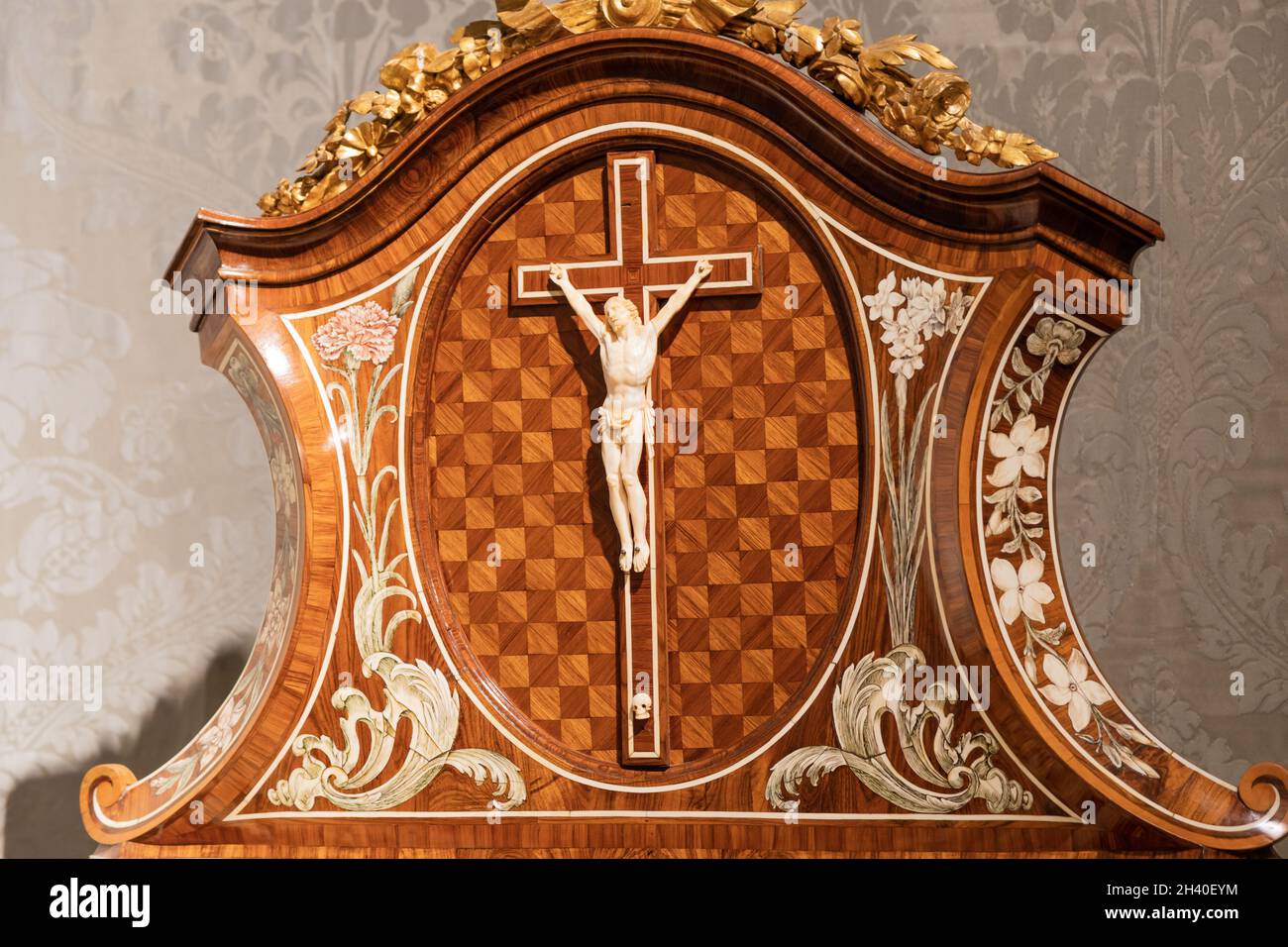 Old crucifix made of wood and ivory. Jesus Christ symbol of resurrection and life after the death. Stock Photo