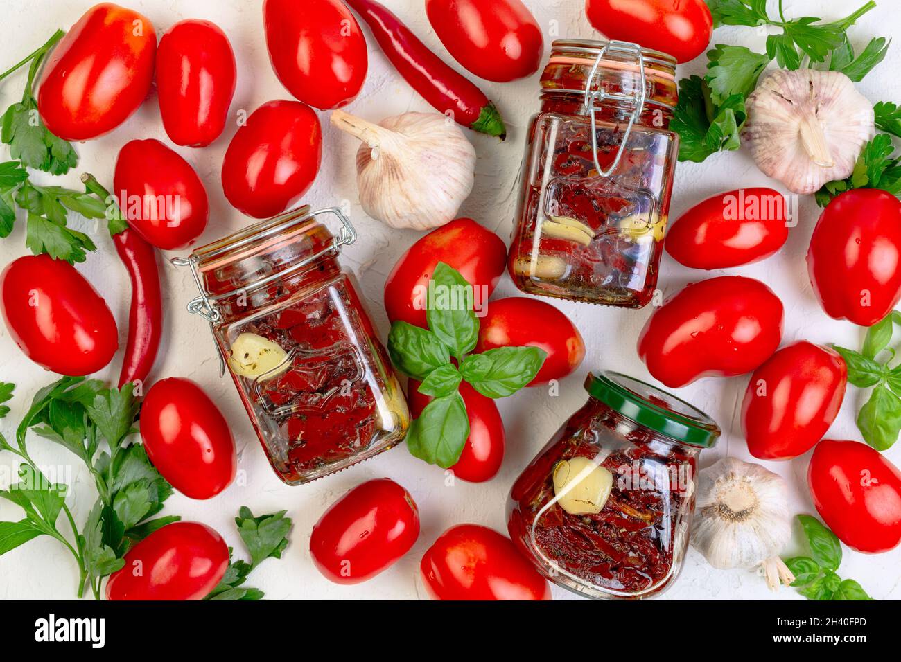 Dried tomatoes in olive oil. Stock Photo